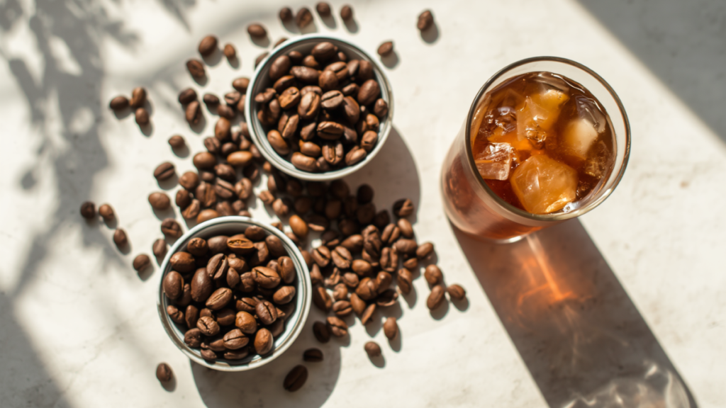 Cold brew coffee maker setup with dark roast beans, ice, and milk
